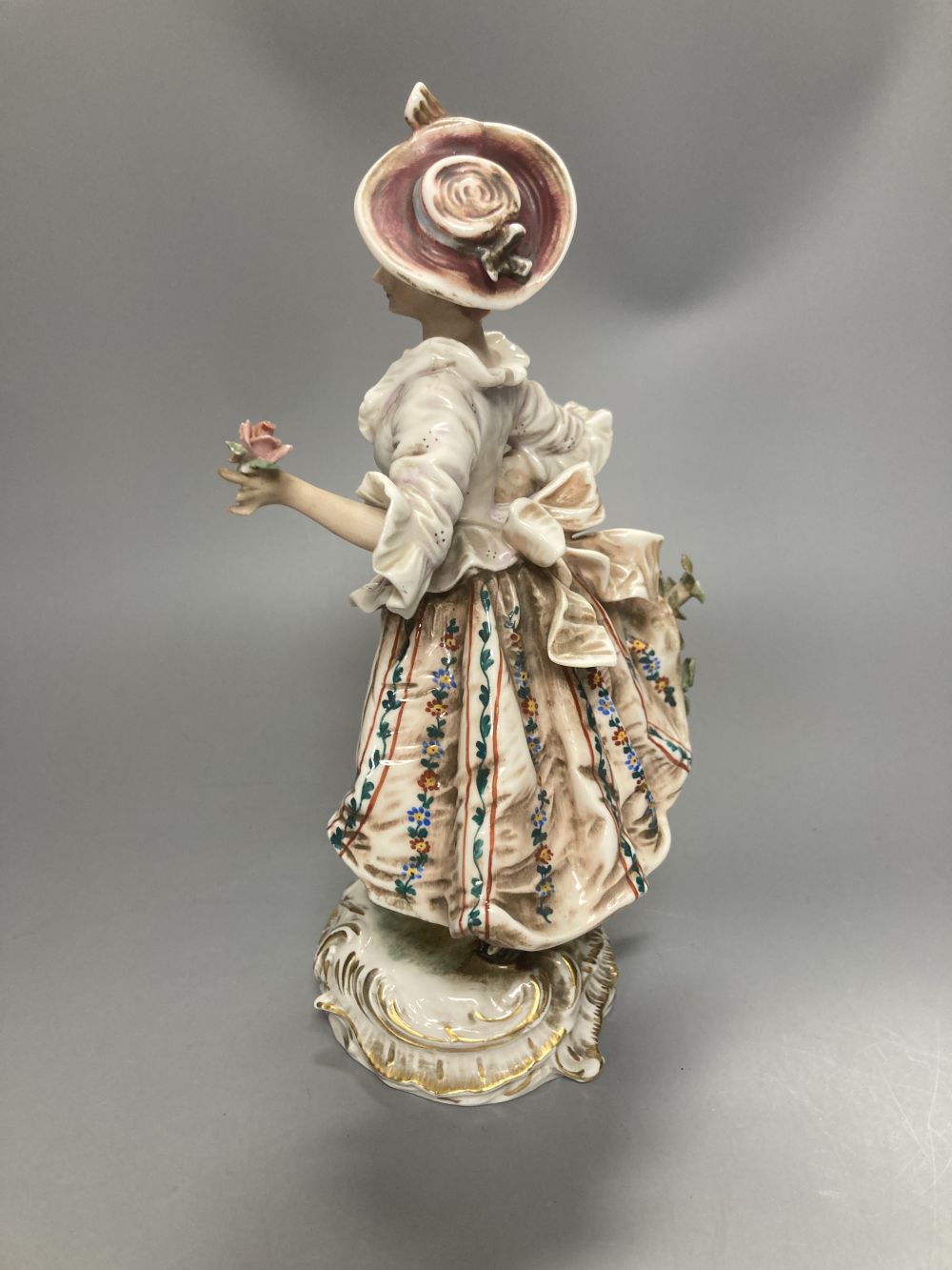 A pair of Wessel Frankenthal figures, 26cm, and a French bisque gallant, 29cm